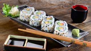 Sushi plate chopsticks tea wooden - a plate of sushi free wallpaper