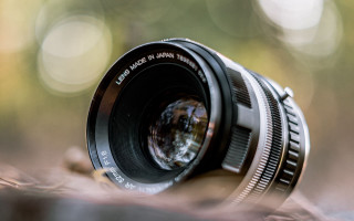 Camera lens closeup blurry background 2 - christopher williams free wallpaper