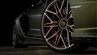 Car wheel closeup dark room - photorealism free wallpaper for desktop