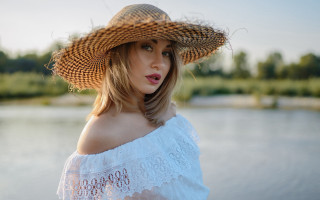 Woman hat lake frizzyhair portrait - a hat free wallpaper
