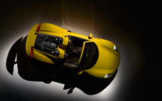 Yellow sports car above dark - ed roth free wallpaper
