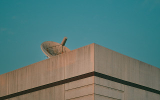 Satellite dish building blue sky - top of a building free wallpaper
