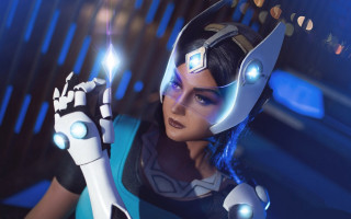 Futuristic woman hologram armor mechanical - a futuristic suit holding free wallpaper for desktop