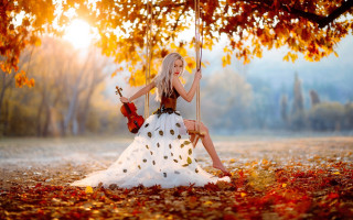 Woman swing park violin autumn - her hand and a tree in the background free wallpaper