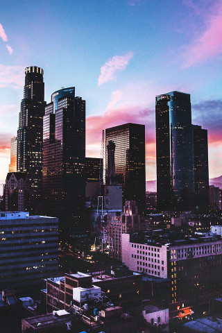 City skyline pink blue sky - a city skyline free wallpaper for mobile