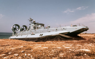Large boat beach ocean clouds - a sandy beach next free wallpaper
