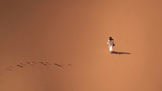 Desert footprints birdseye orange sunset - footprint free wallpaper