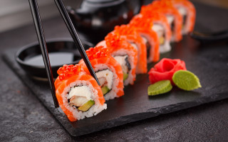 Sushi roll chopsticks garnish black 2 - a black plate free wallpaper