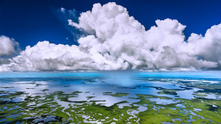 Large cloud water green field - a green field below free wallpaper
