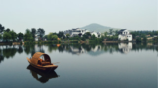 Small boat lake hillside architecture - top of a lake next free wallpaper