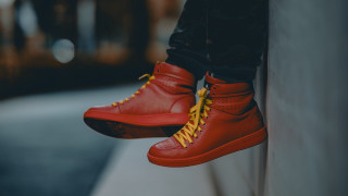 Person red yellow sneakers wall - fashion free wallpaper