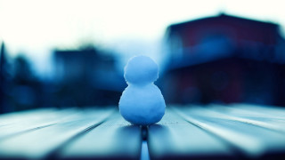Small snowman wooden table cityscape - winter free wallpaper