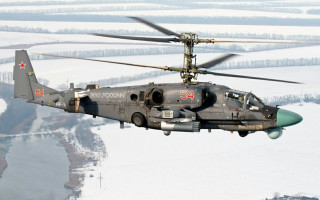 Military helicopter snowlandscape redstar jigsaw - over a snow free wallpaper