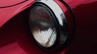 Red car headlight ultrafine photorealism - a black stripe free wallpaper