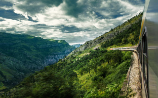 Lush green mountain train cloudy - a train traveling free wallpaper for desktop