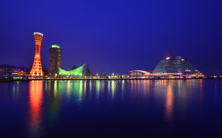 City skyline tower lit water - a large building free wallpaper