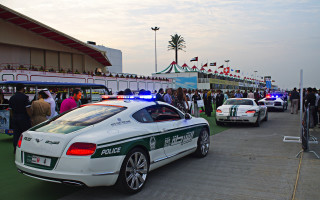 Police car crowd carnival street - a police car free wallpaper