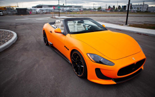 Bright orange sports car cobra - a black roof free wallpaper