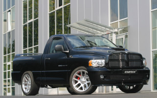 Black truck building large window - a black truck free wallpaper