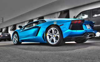 Blue sports car parking lot 4 - a parking lot next free wallpaper