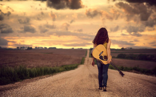 Woman guitar beach dusk mountains - free sunset wallpaper