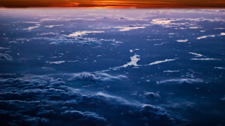 Sky sunset clouds ocean mountains - zenith view free wallpaper