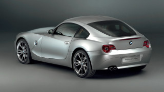 Silver sports car studio panfuturism - a black background behind free wallpaper