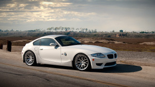 White sports car desert cloudy - the side of the road in the desert free wallpaper