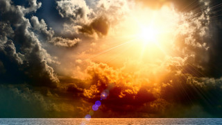 Bright sun clouds ocean boat - a bright sun free wallpaper