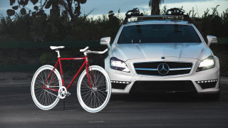 Red bike white car parking - christian hilfgott brand free wallpaper for desktop