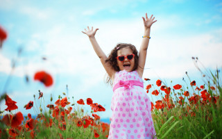 Girl arms up flower field - little free wallpaper