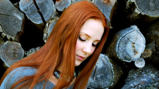 Redhair woman logs closedeyes longhair - christen dalsgaard free wallpaper