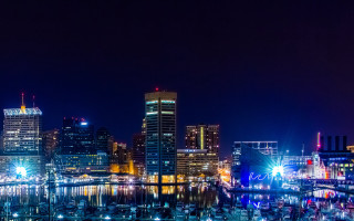 City skyline night lights boat - the water in front free wallpaper