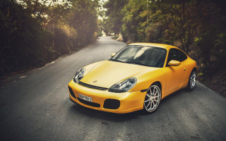 Yellow sports car woods sunlight - the background and sunlight free wallpaper