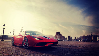 Red sports car cobblestone city - farid mansour free wallpaper for desktop