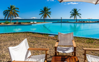 Pool side chairs umbrella beach - a white cloth free wallpaper