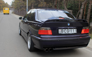 Black car parked road yellow - daryush shokof free wallpaper for desktop