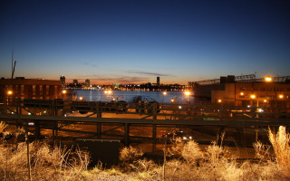 Bridge river night city lights - the water behind free wallpaper