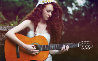 Redhead woman playing guitar outside - outside free wallpaper for desktop