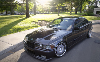 Black car park road trees - the car free wallpaper