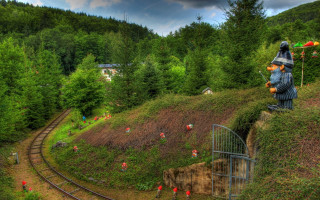 Statue man traintrack forest ecological - a statue of a man free wallpaper for desktop