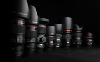 Camera lenses row black background 2 - wide len free wallpaper