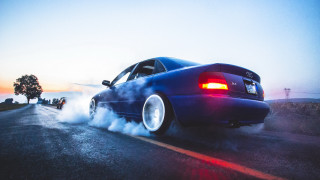 Blue car smoke exhaust road - a blue car free wallpaper