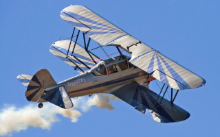Small airplane blue sky smoke 2 - free airplane wallpaper
