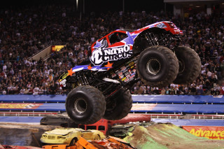 Monster truck mid air dirt 2 - a monster truck free wallpaper for desktop