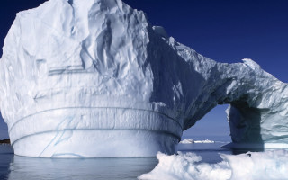 Large iceberg ocean shoreline boat - a shore line free wallpaper for desktop