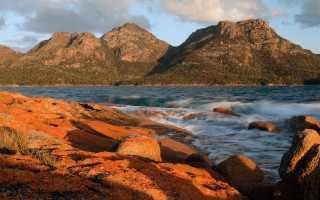Rocky shore mountains clouds autumn - rich moody colours free wallpaper