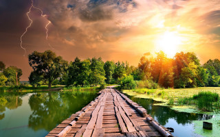 Wooden bridge river lightning sky - a lightning free wallpaper