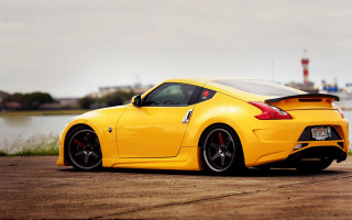 Yellow sports car water city - a yellow sports car free wallpaper