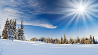 Sunny snowy day mountains ocean - crepuscular ray free wallpaper